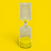 Glass 10-minute hourglass with yellow sand from the mindful sh*t Kit